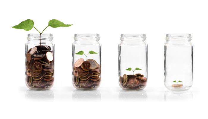 Four jars in a row showing gradual growth of a plant. the first jar is filled with coins and a sprout, with each subsequent jar having fewer coins and larger plant growth until the last jar, which is empty with a small tree.